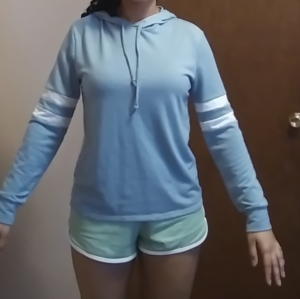 Baby blue long sleeve top.